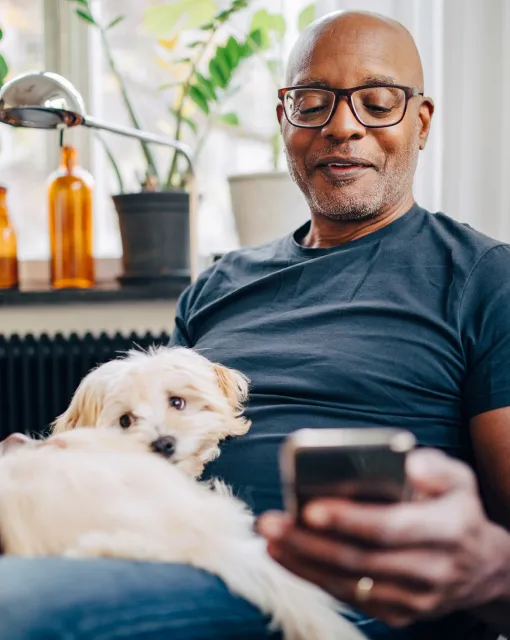 Older man looking at phone